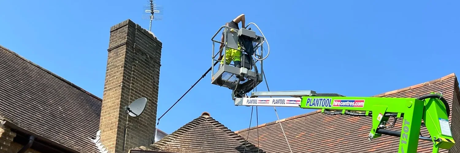 Clay tile roof after cleaning and painting in Northampton, March 2024
