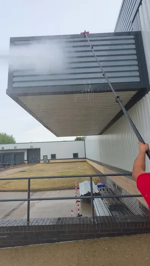 commercial building metal cladding canopy soffit pressure washed extension lance