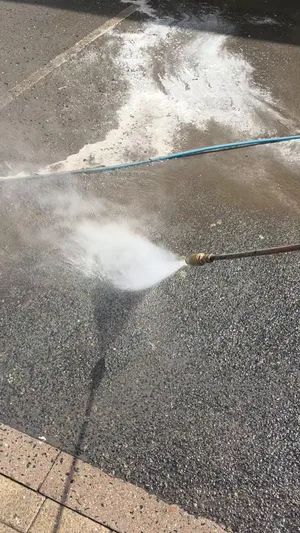commercial car park tarmac pressure washed algae removal mid pass