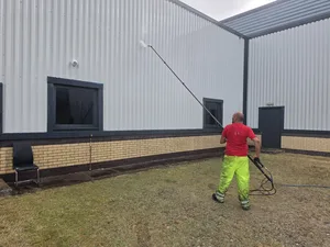 commercial building metal cladding water fed pole wash algae removal