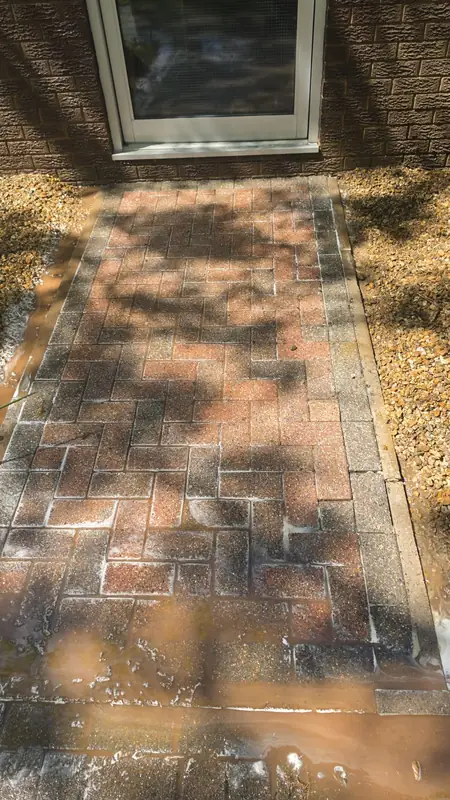 Brick paving split clean section vibrant red, Northampton.