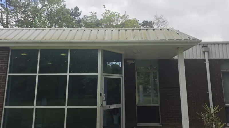 Entrance canopy cladding before glass curtain wall, Northampton.