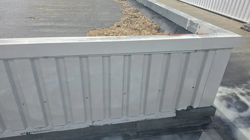 Flat roof parapet after clean rinsed, Northampton.