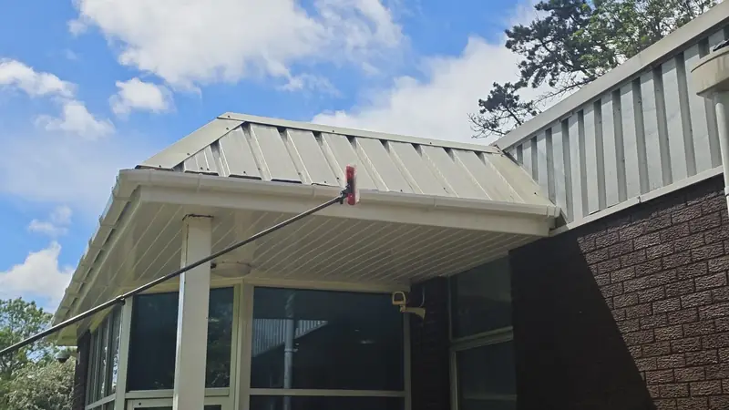Red brush head finishing porch cladding, Northampton.