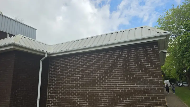 Side wall brick cladding elevation wide before, Northampton.