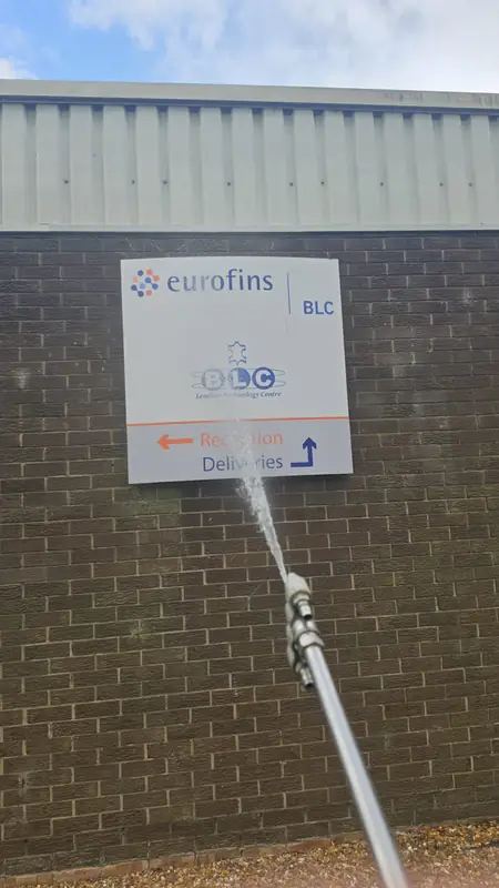 Soft wash below eurofins blc reception sign, Northampton.