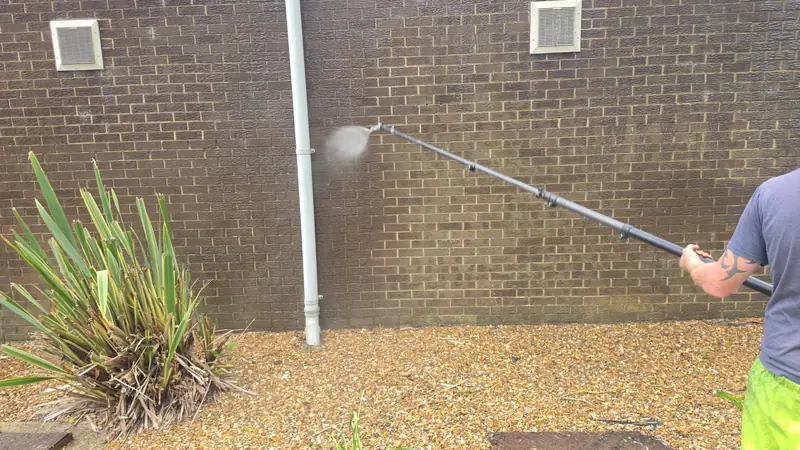 Soft wash brick base wall near planting, Northampton.