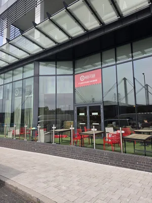 Before - commercial venue large glazing facade atmospheric grime aluminium frames, Birmingham.