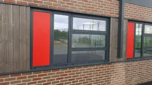 commercial school aluminium framed windows red brick facade water fed pole clean