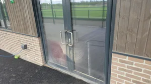 Before - commercial school entrance double doors heavy soiling smearing, West-Bromwich.