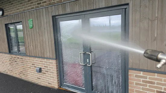 commercial school buff brick facade window cleaning operative