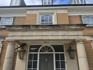 Before - grand residential portico buff brick stone algae biological staining, Orlingbury.
