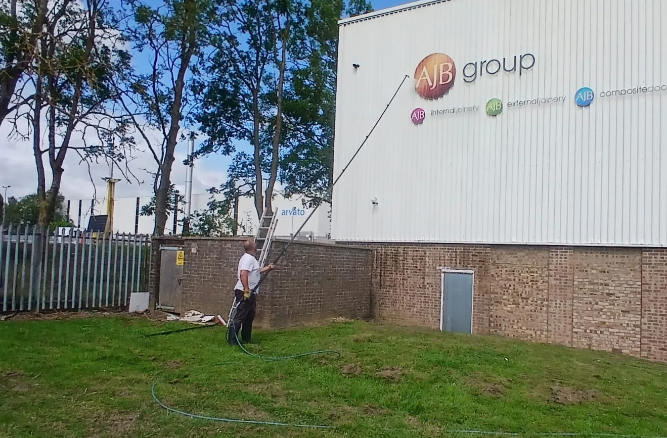 AJB Group warehouse cladding cleaning in Corby - telescopic pole cleaning 40,000 sq ft exterior