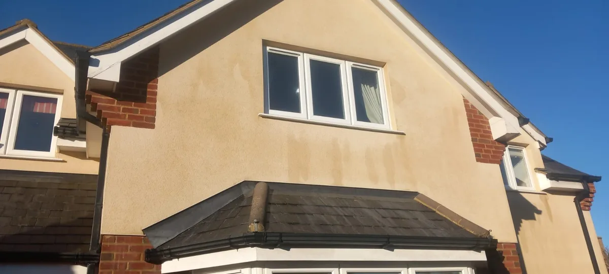 House render after soft wash cleaning - original colour restored