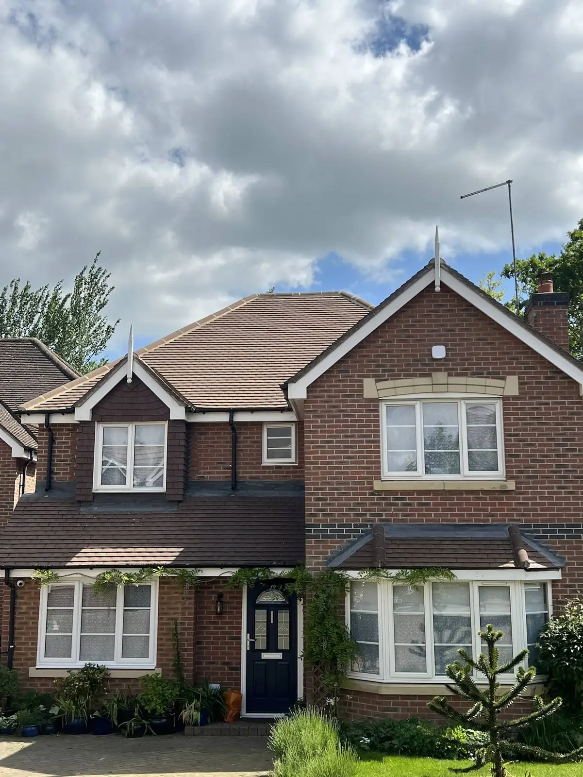 Detached home roof still clean two years after ECS roof cleaning and DDAC biocide treatment